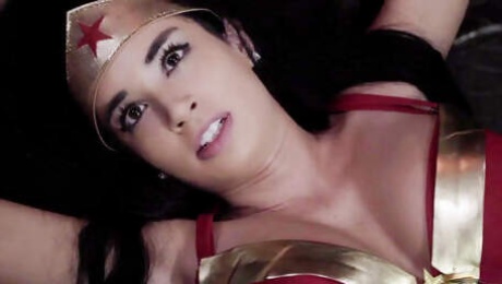 Sexy wonder woman gets humiliated by two hunky studs